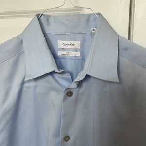 Men’s Calvin Klein Slim fit button up light blue Size:
Neck 15.5 
34/35